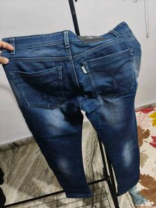 Calvin Klein trendy Distressed Blue Jeans for sale