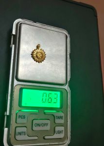 Sun Face Pendant 18 k pure gold