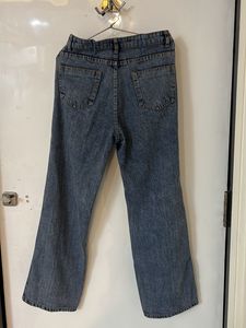 Distressed Blue Denim Jeans