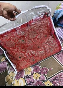 Red chiffon zari saree with stitched blouse