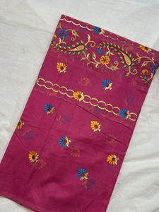 Pink embroidered fabric.