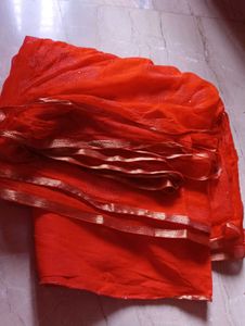Orange Saree with Floral Embellishments