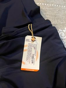 Brand New True REVO Multi Pocket  Leggings