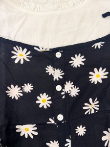 Chic Daisy Print Black Dress with Puff Sleeves
