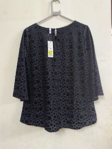 Elegant Black Polka Dot Top
