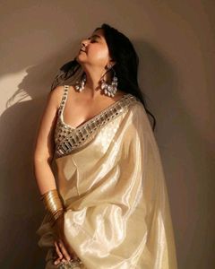 Elegant Cream Saree with Embellished Blouse