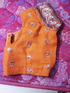 Elegant Orange Embroidered Saree