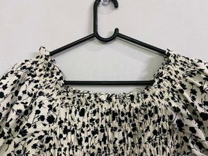 Chic Floral Smocked Peplum Top