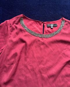 Elegant Maroon Top with Embellished Neckline