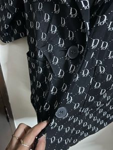 Chic Black Blazer with White Pattern
