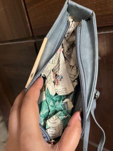 Grey half moon sling bag