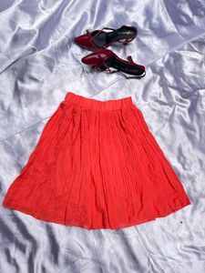 Vibrant Orange Pleated Skirt