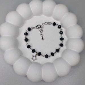 Black Beaded Bracelet with Star Charm