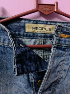Distressed Blue Denim Jeans