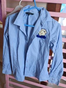 Light Blue Button-Up Shirt with Floral Detail