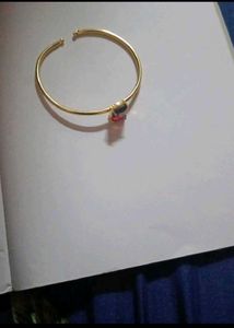 Gold Tone Bracelet with Dual Color Stone