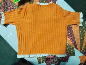 This top has a charming, cottagecore-inspired vibe