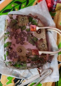 Glossy PolyVinyl material Floral Print Handbag