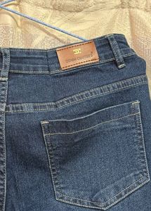 Flared Denim Jeans with Rhinestone Detail