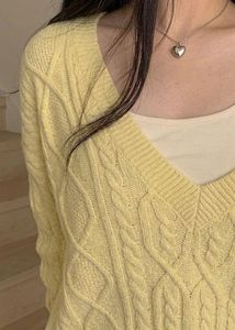 Distressed Pastel Yellow V-Neck Sweater