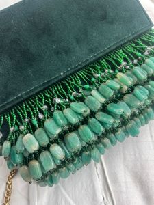 Elegant Green Suede Bag with Bamboo Handle