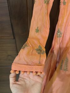 embroidered orange anarkali suit