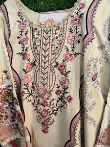 Elegant Beige Kurta with Intricate Embroidery