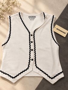 Cream Sleeveless Top with Black Trim