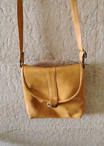Mustard Sling Bag. Looks Very Good