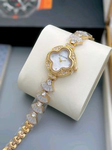 louis vuitton diamond studded ladies watch