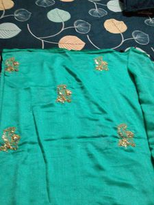 Elegant Teal Saree with Gold Embroidery
