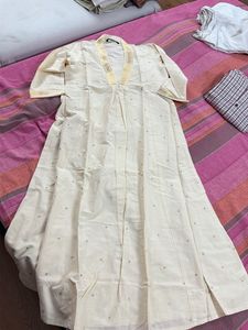 Elegant Cream Kurta with Gold Trim