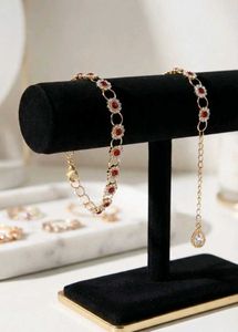 Elegant Red & Gold Bracelet