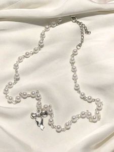 Chic Pearl Necklace with Bow Charm