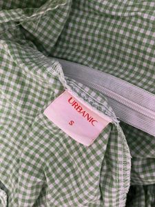 Green tie on summer dress