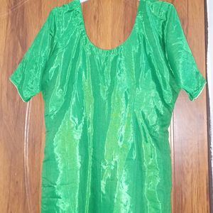 Green silk color kutra with lace in front. perfect for mending functions.  custom made..size 42.never worn