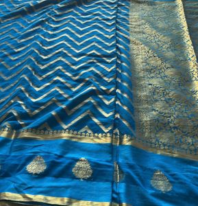 Vibrant Blue Saree with Gold Zigzag Pattern