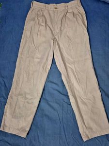 Classic Cream Pleated Trousers
