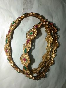 Gold Matte Finish Green And Red Stones Studded Flower Designed Metal Bangles