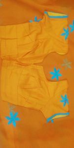 Orange embroidered saree