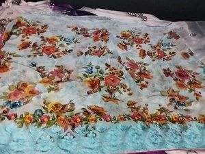 Elegant Floral Saree with Embellished Blouse