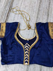 Orange Embroidered Saree with Blue Blouse