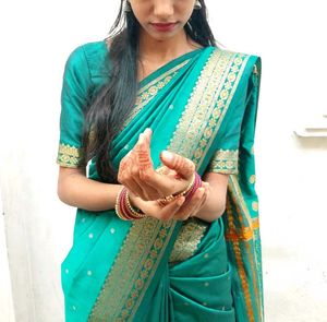 Elegant Teal Saree with Gold Border