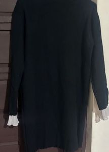 Black Mock Neck Top with Ruffle Detail