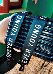 Black Clutch with "Forever Young" Strap