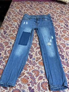 Distressed Patchwork Jeans