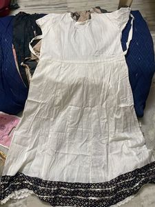 Elegant White Embroidered Kurti