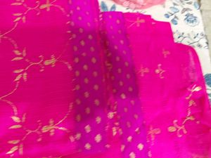 Vibrant Pink Saree with Gold Motifs