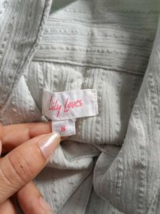 Light Blue Sleeveless Collared Shirt