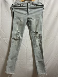 Light Wash Ripped Jeans with Side Stripe
